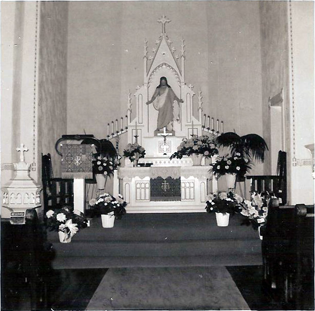 Altar dressed with flowers for a special occasion, c. 1950s–1960s
